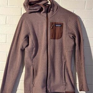 Patagonia women’s light purple jacket